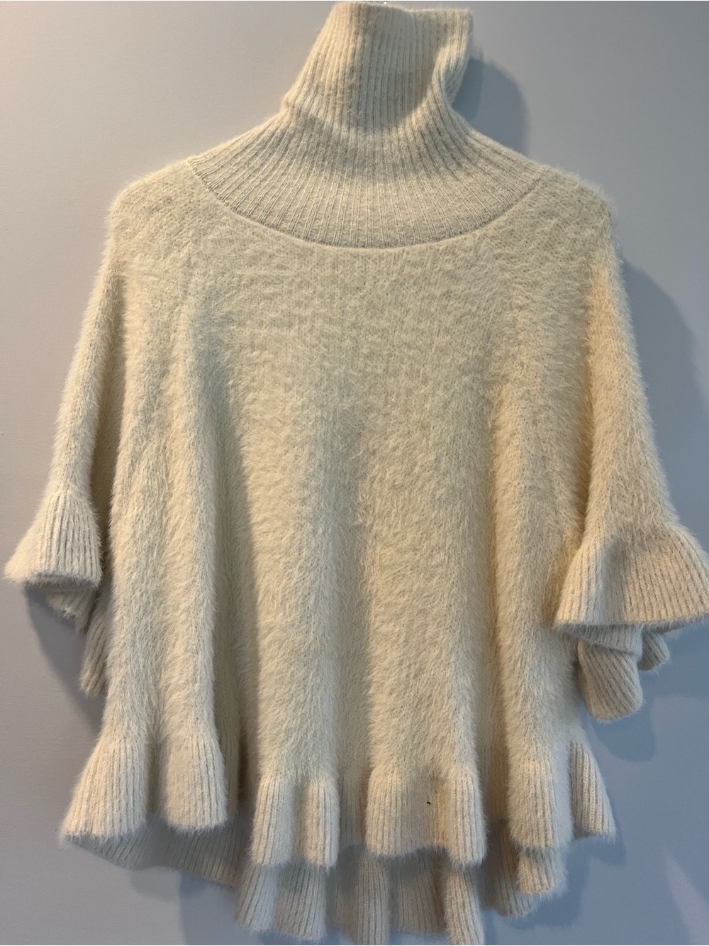 Anthropologie Cream Turtleneck Poncho Sweater with Ruffle Hem